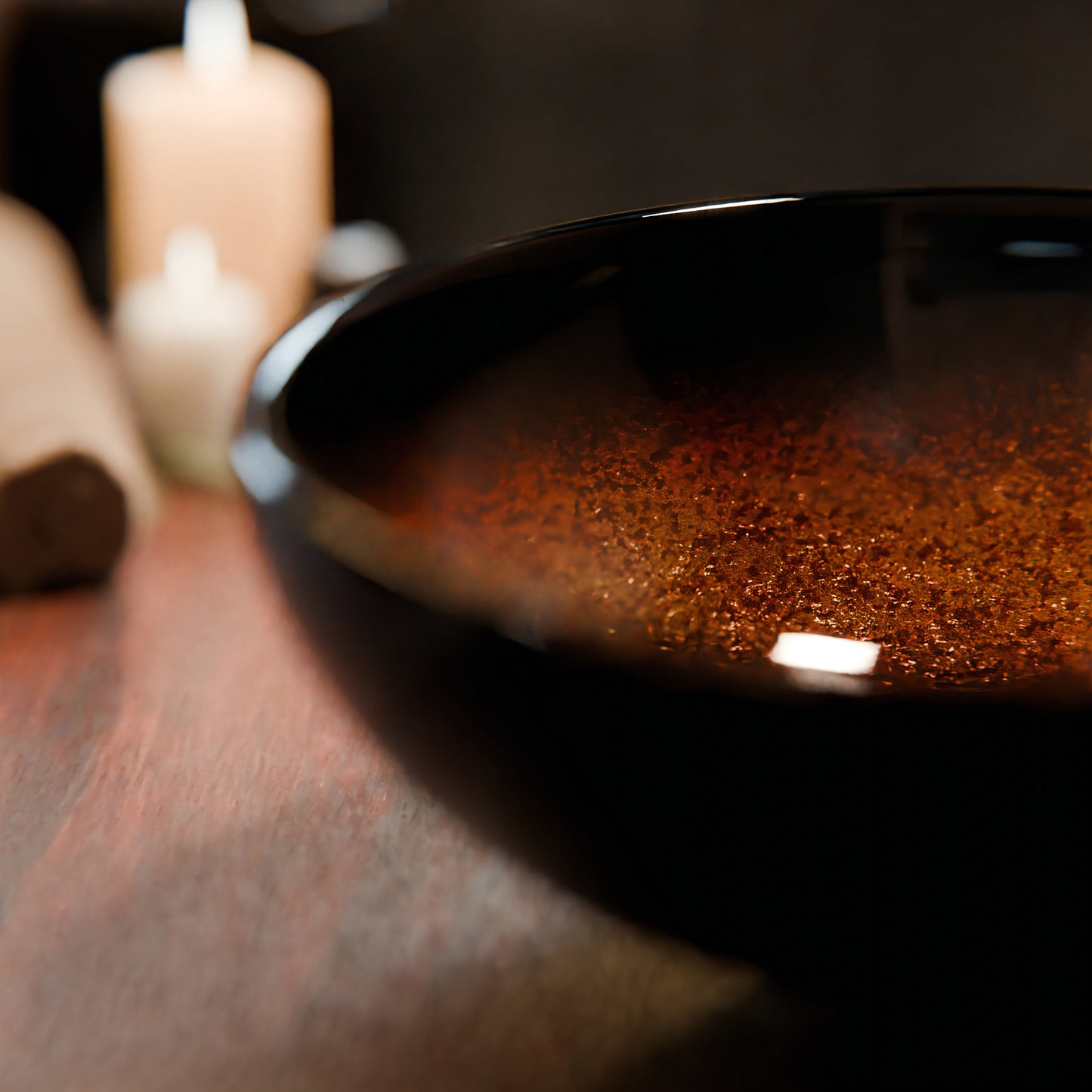 Mini 12-inch black and copper round glass vessel sink by Novatto, transitional bathroom sink with sleek glass design.