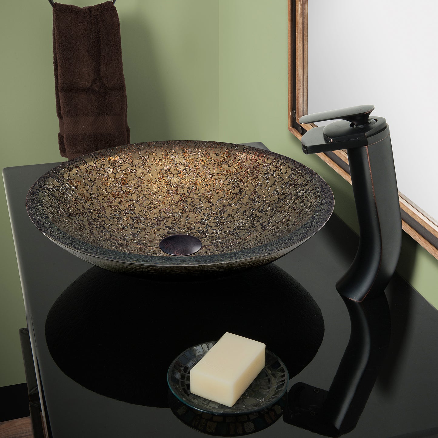 Novatto Cascade modern waterfall single-hole vessel bath faucet in oil-rubbed bronze with sleek design, installed in a contemporary bathroom setting