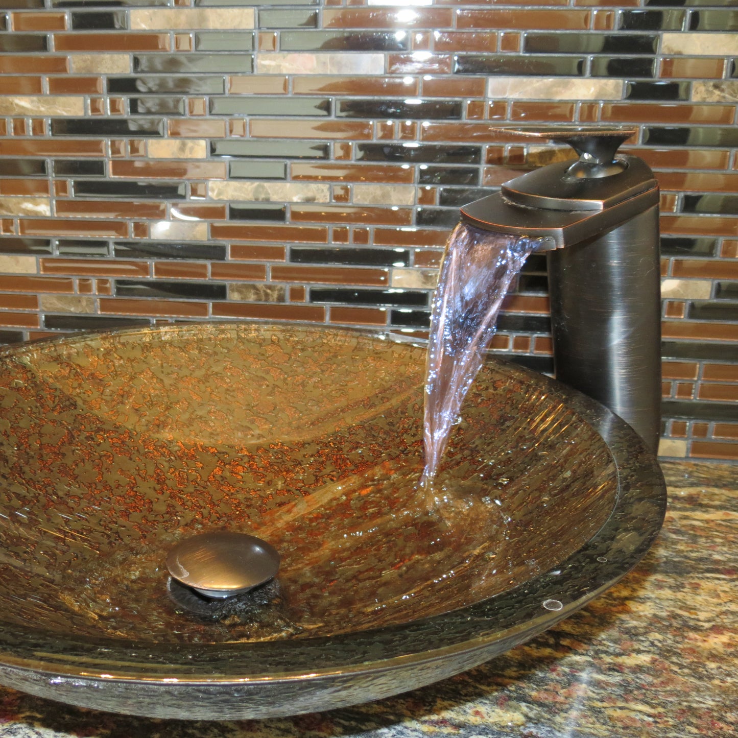 Hand painted green khaki glass vessel bathroom sink by Novatto, showcasing a stylish transitional design with a smooth, rounded surface.