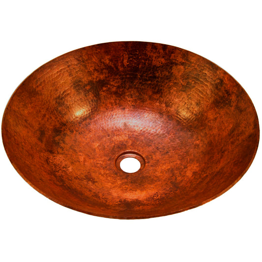 Round hammered copper vessel sink in natural finish, traditional bathroom sink by Novatto, top view showing textured surface.