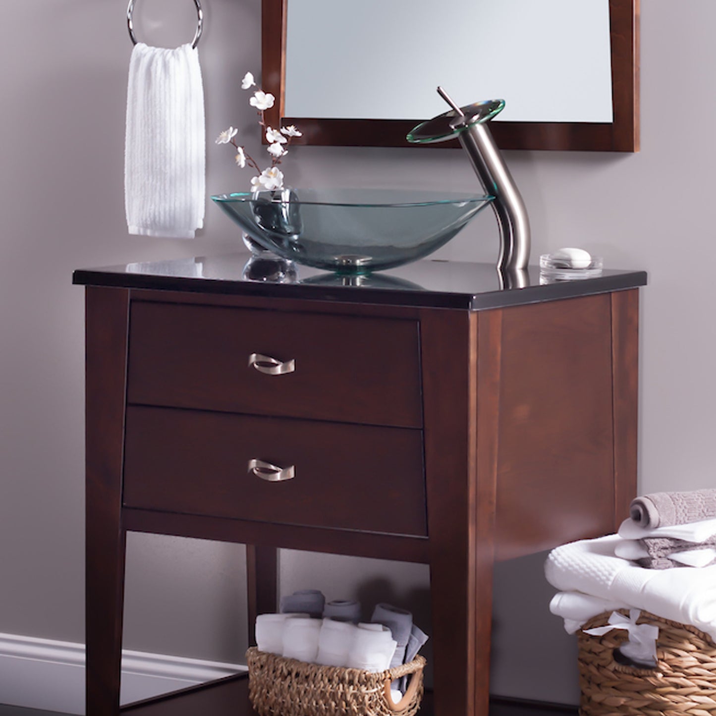 Modern clear square tempered glass vessel bathroom sink by Novatto with sleek design, shown in a stylish bathroom setting.