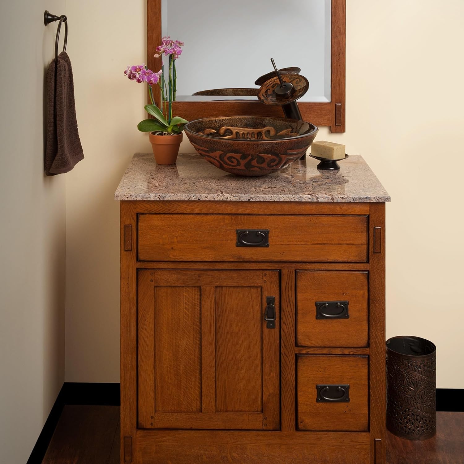 Hand-painted brown and tan mosaic glass vessel sink by Novatto, traditional bathroom fixture with intricate tile design.