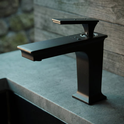 Novatto GF-368S Series single handle traditional bathroom faucet with chrome finish, mounted on a bathroom sink.