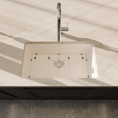 Novatto StoneCore 30-inch single bowl kitchen sink in limestone with included accessories, showcasing durable natural stone material.