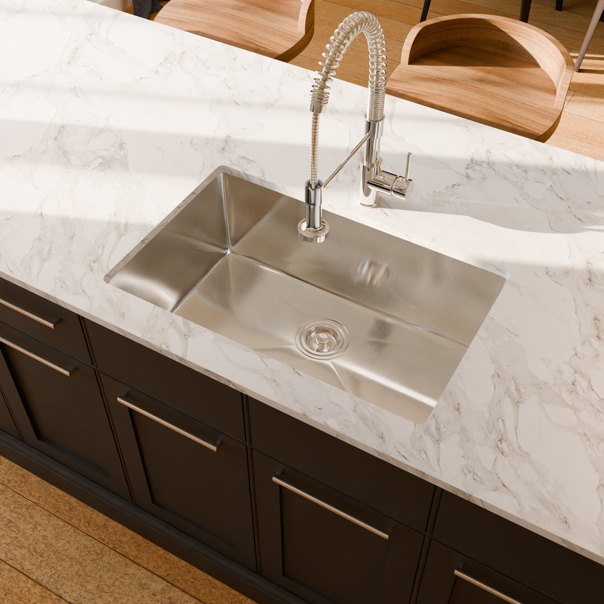 Novatto dual action commercial-style pull-down bar and prep faucet in stainless steel with sleek design and flexible spray head.