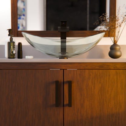Modern clear oval tempered glass vessel bathroom sink by Novatto, with sleek design and polished surface for contemporary bathrooms.