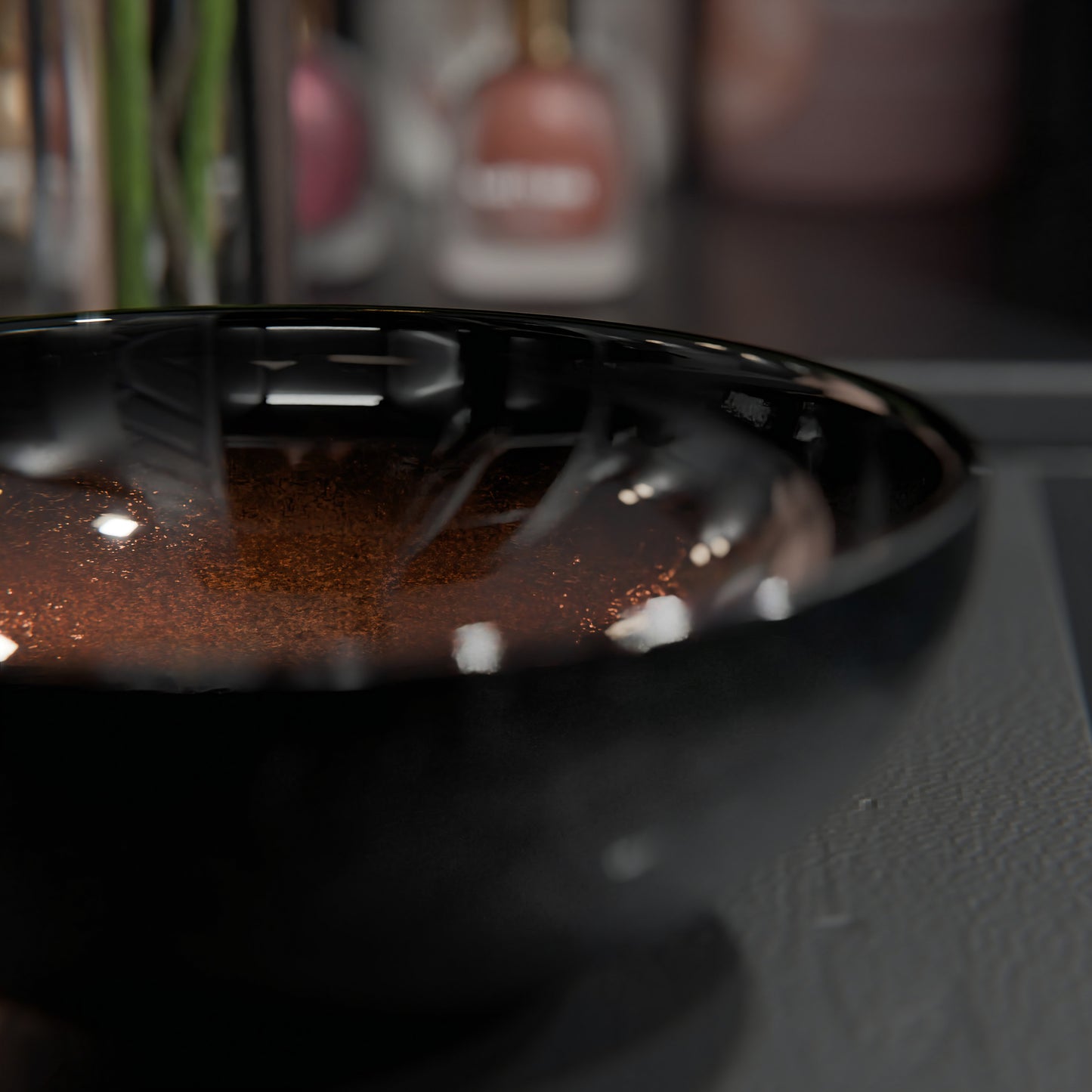 Mini 12-inch black and copper glass vessel sink from Novatto, transitional bathroom sink with round design and modern finish.