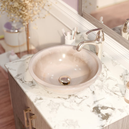 Transitional white onyx stone bathroom vessel sink by Novatto, featuring a smooth, polished surface and elegant design.