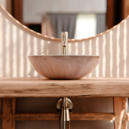 Natural white onyx stone vessel bathroom sink by Novatto, featuring a smooth, transitional design and polished surface.