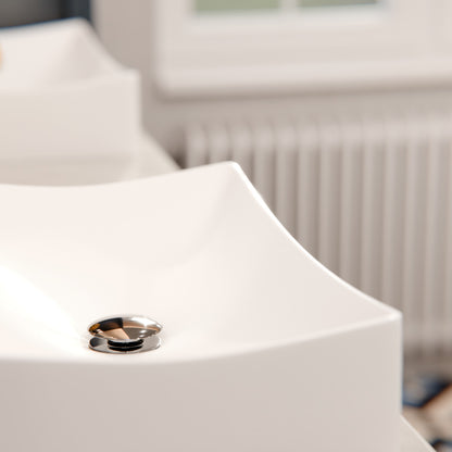 White porcelain vessel bathroom sink with rectangular shape and smooth finish, designed for modern bathroom decor.