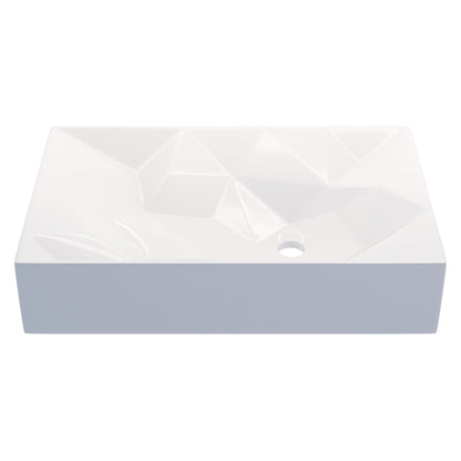 White modern rectangular porcelain vessel sink with geometric design by Novatto, shown from a top angle.