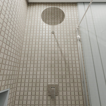 Novatto 10-inch round rainfall shower head for shower and bathtub, chrome finish, wide water spray with sleek design.