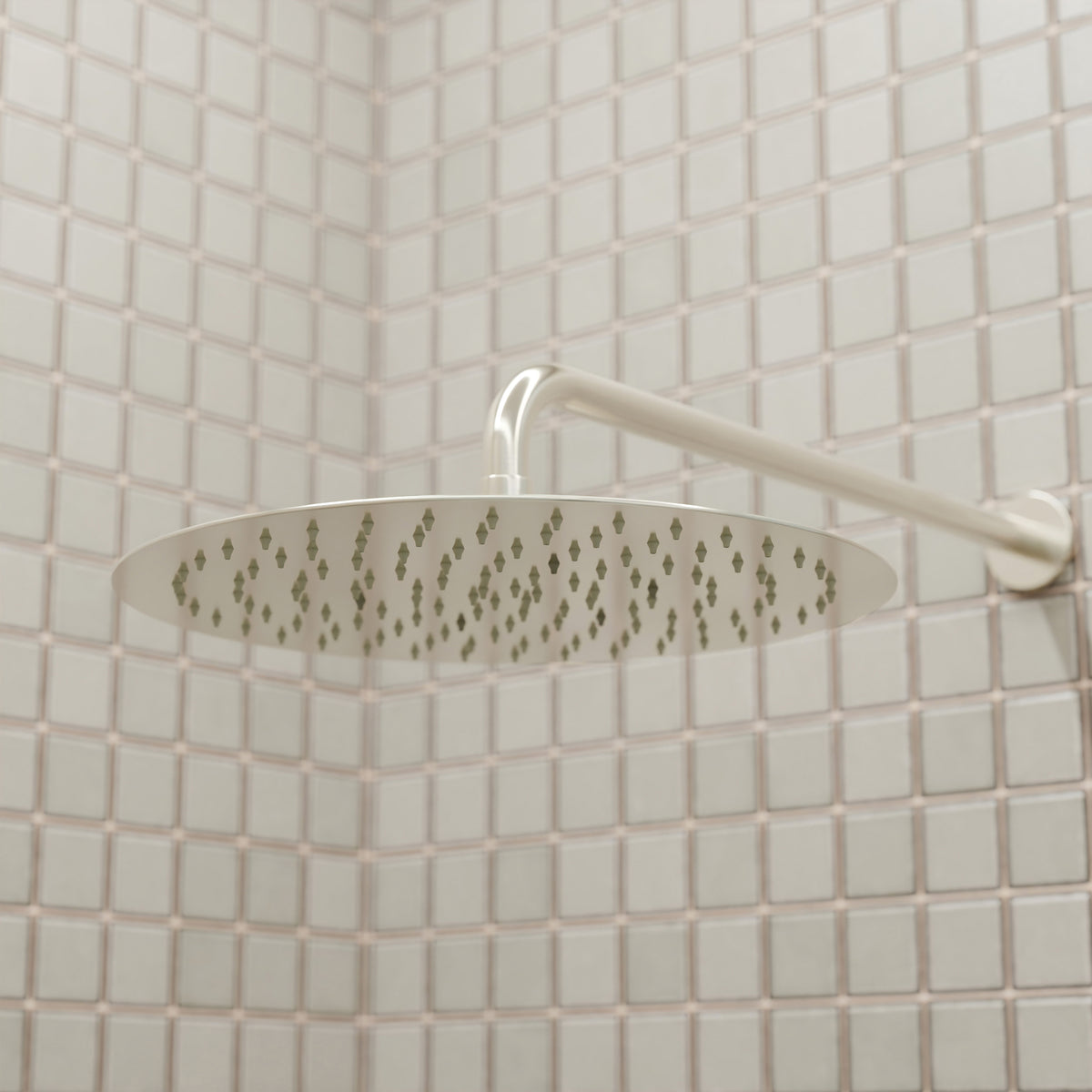 Novatto 12-inch round rainfall shower head for shower and bathtub, featuring a sleek chrome finish and wide water coverage.