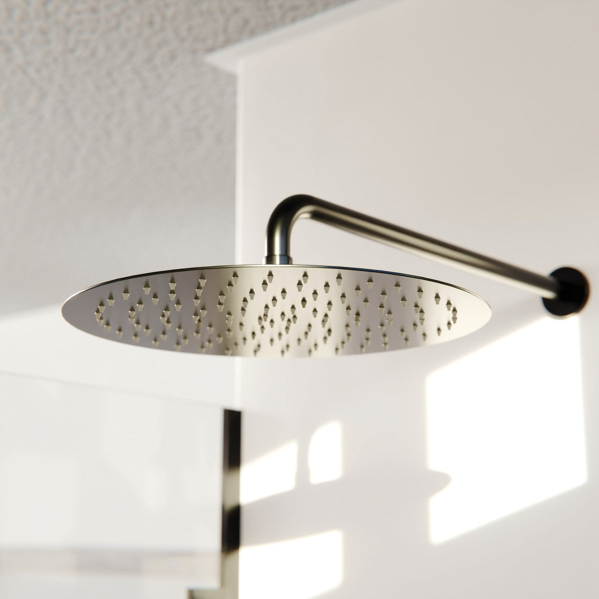 Novatto 12-inch Round Rainfall Shower Head for shower and bathtub, featuring a sleek chrome finish and multiple spray settings.