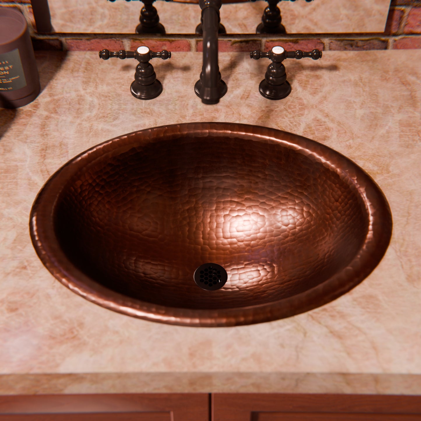 Oval rolled rim copper drop-in bath sink in antique finish by Novatto, traditional bathroom sink with smooth, rounded edges.