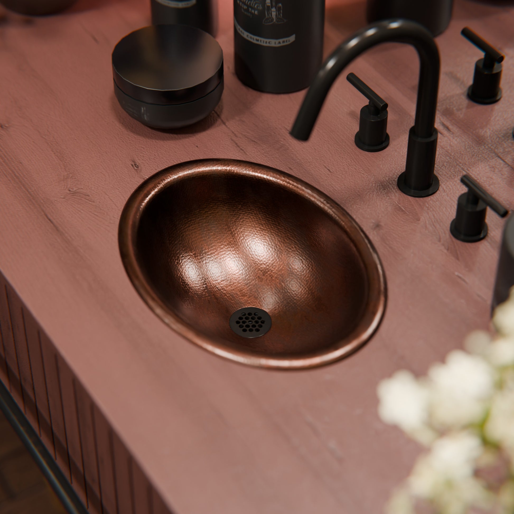 Small oval copper drop-in bath sink by Novatto, antique finish, transitional style, suitable for bathroom vanity.