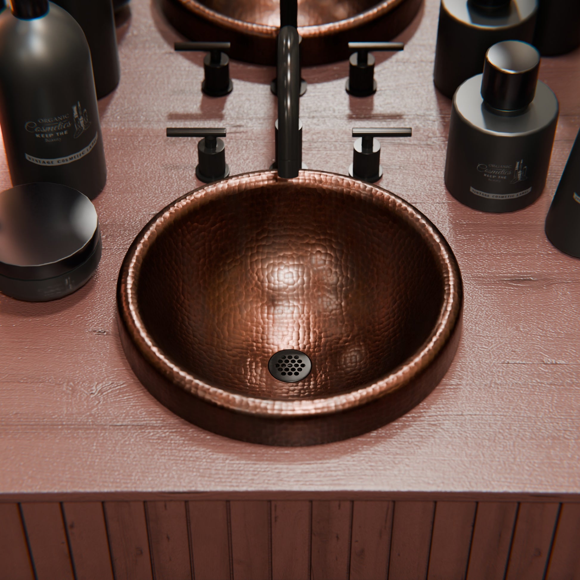 Round copper drop-in bathroom sink by Novatto with antique finish, traditional style, featuring a smooth, polished surface.