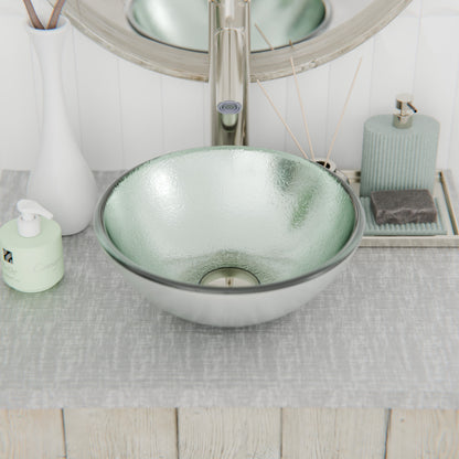 Mini 12-inch silver foiled round glass vessel bathroom sink by Novatto, modern design with sleek glass finish.