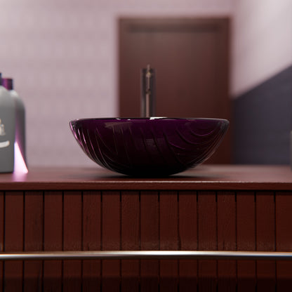 Hand painted purple glass bathroom vessel sink by Novatto with sleek modern design, featuring a smooth, rounded surface and vibrant color.