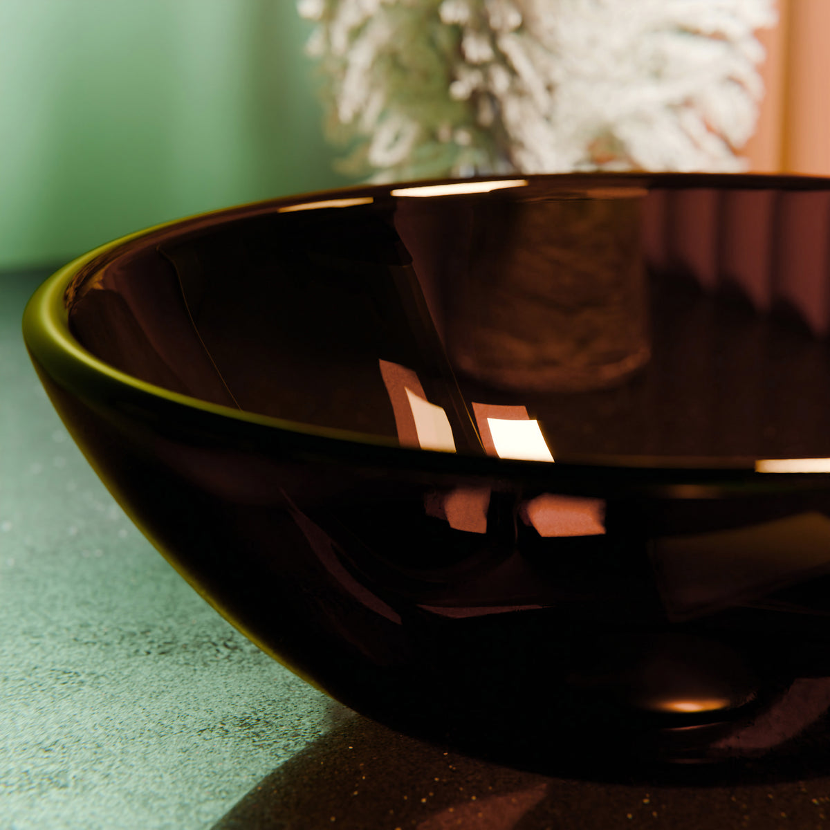 Clear brown round tempered glass vessel sink by Novatto, modern bathroom design with smooth glass surface.