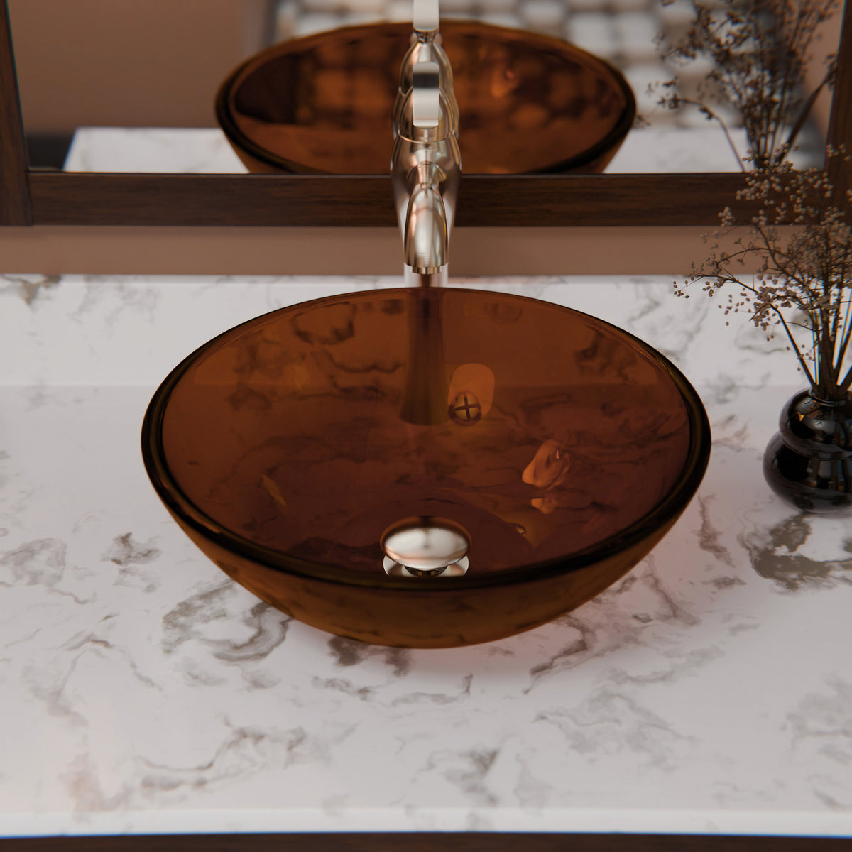 Clear brown round tempered glass vessel bathroom sink by Novatto, modern design with smooth, rounded shape for contemporary bathrooms.