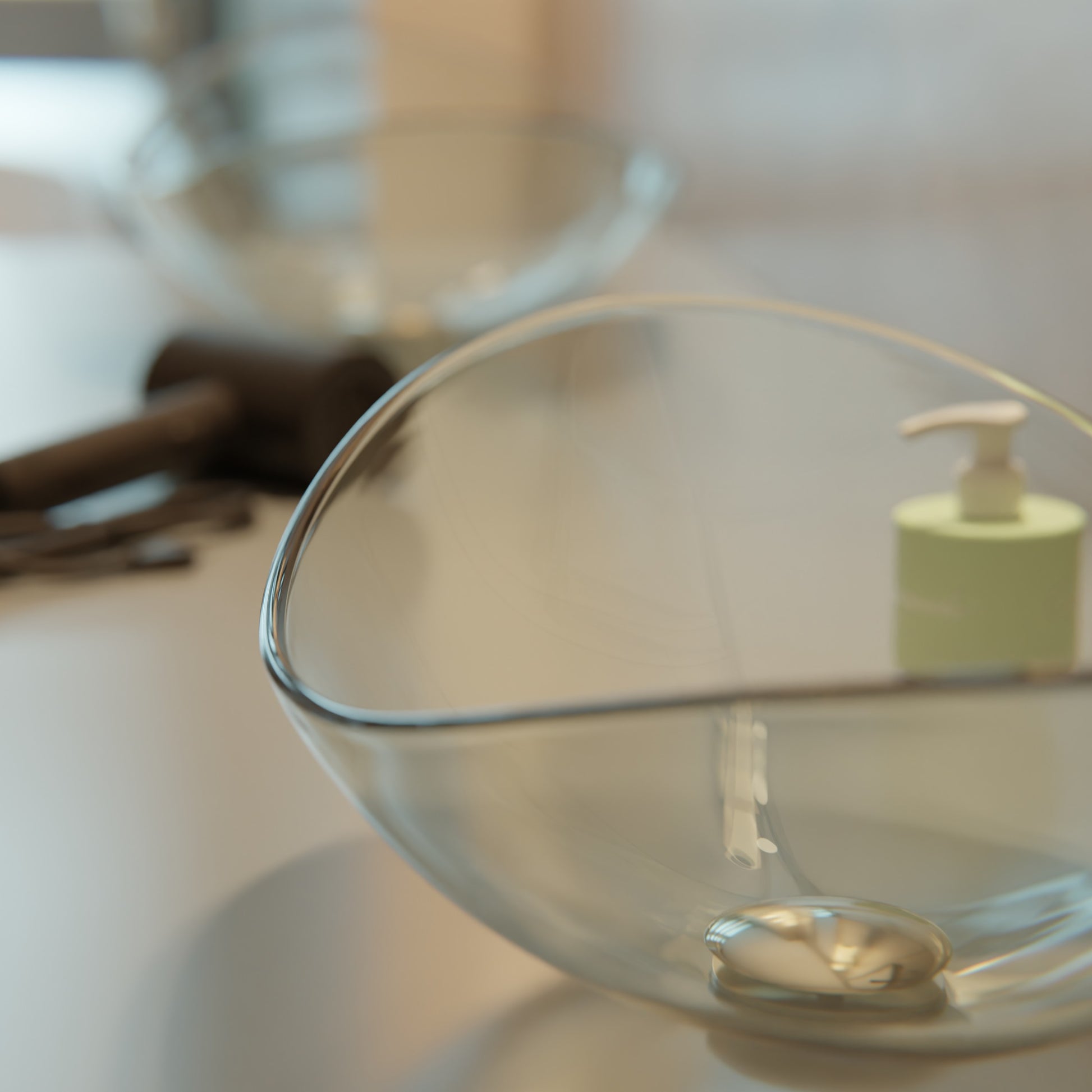 Clear oval tempered glass vessel sink by Novatto, modern bathroom sink with sleek design and polished surface.