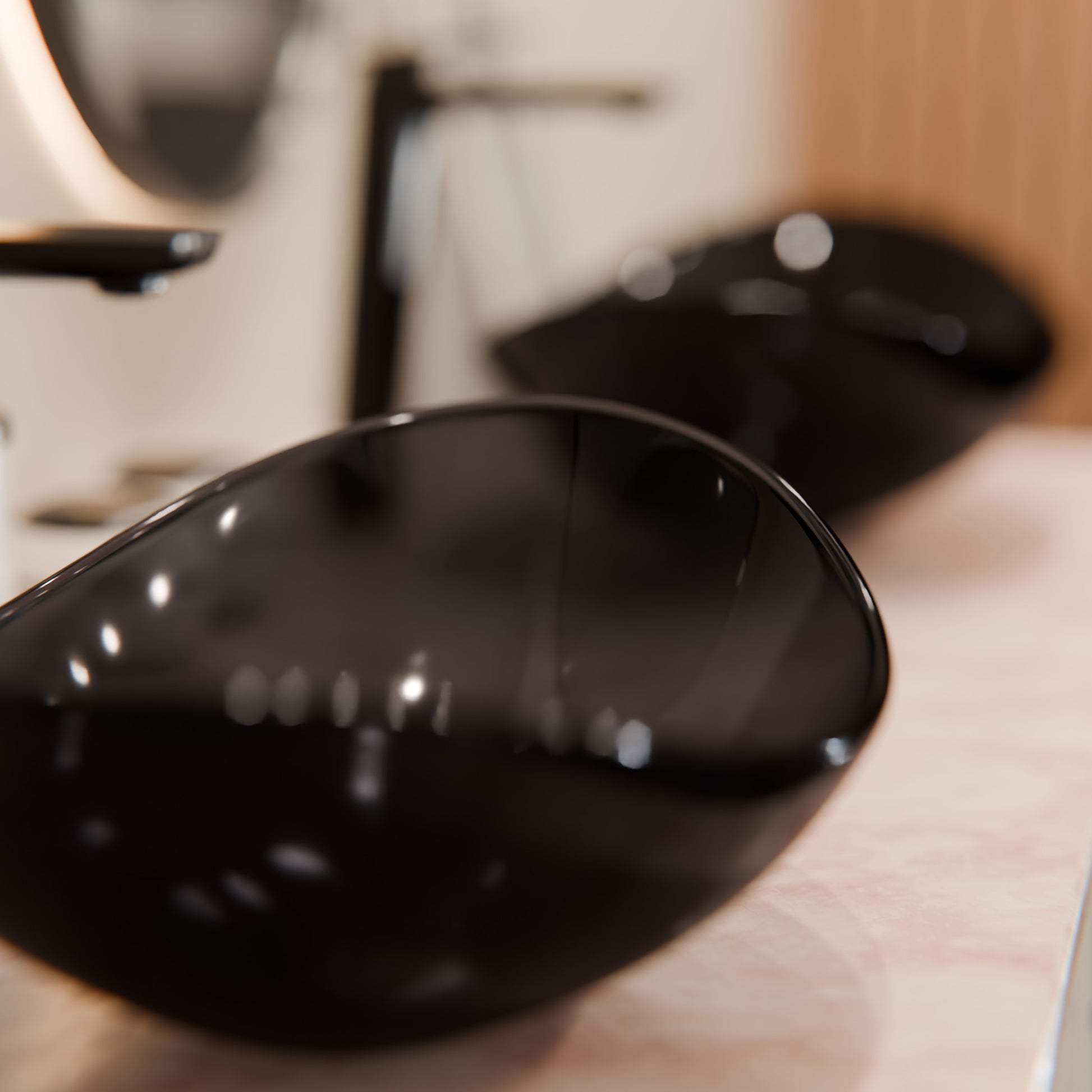 Modern bathroom combo featuring a clear slate grey glass vessel sink and matching faucet by Novatto in a sleek design.