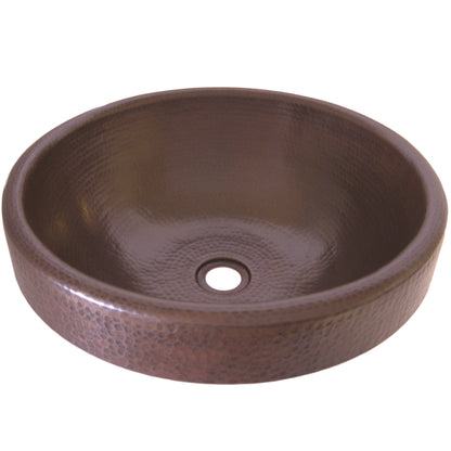 Traditional round copper drop-in bathroom sink by Novatto, antique finish with front view showing smooth, rounded basin and polished surface.