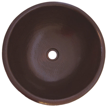 Round copper drop-in bathroom sink in antique finish, traditional style, with top view showing smooth interior and polished exterior.