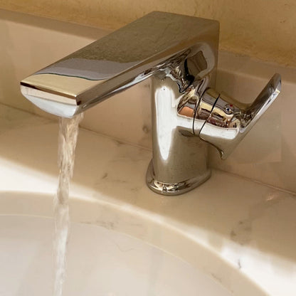 Modern Novatto single handle lavatory faucet from the NBF-061 series, shown installed in a bathroom setting with sleek design.