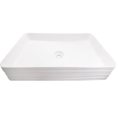 Rectangular white porcelain vessel sink with grooved exterior, designed by Novatto, shown from an angled downward view.