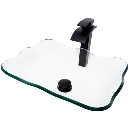 rectangular clear glass vessel sink with matching faucet and pop-up drain