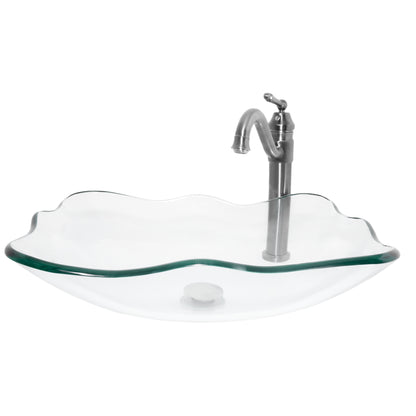 rectangular clear glass vessel sink with matching faucet and pop-up drain