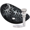 black and silver oval glass vessel sink with brushed nickel pop-up drain
