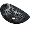 black and silver oval glass vessel sink