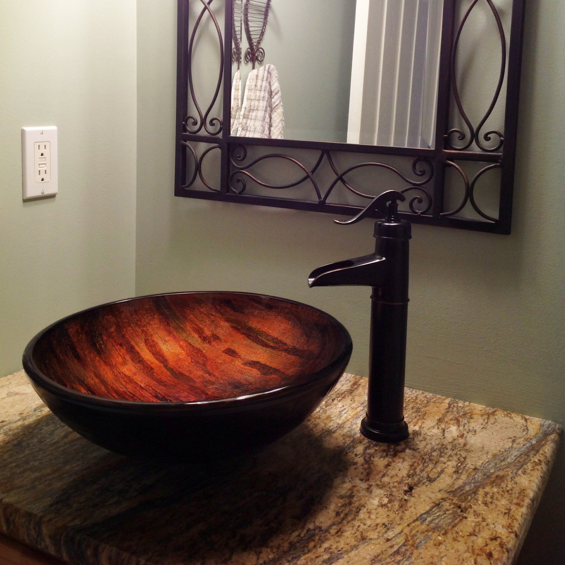 Hand painted brown camouflage glass vessel sink by Novatto, modern bathroom fixture with a stylish, artistic design.