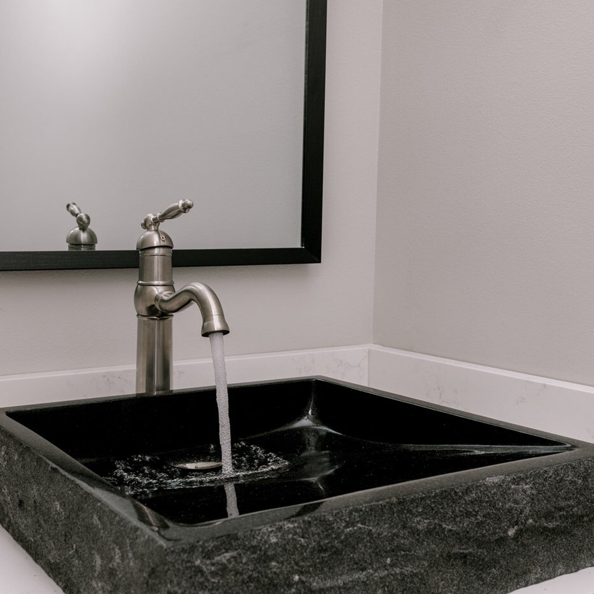 black granite stone vessel sink