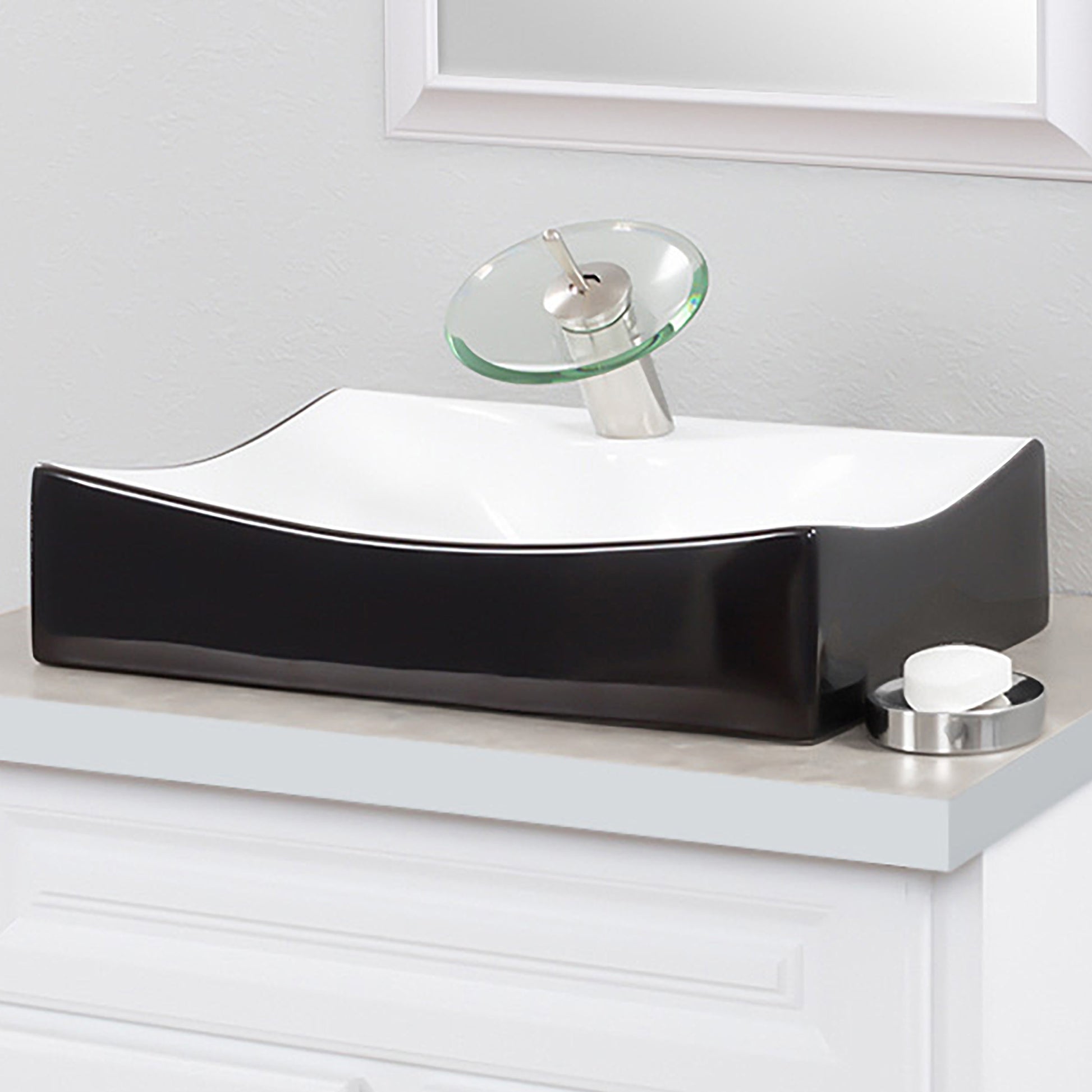 black and white bath sink with faucet and drain lifestyle