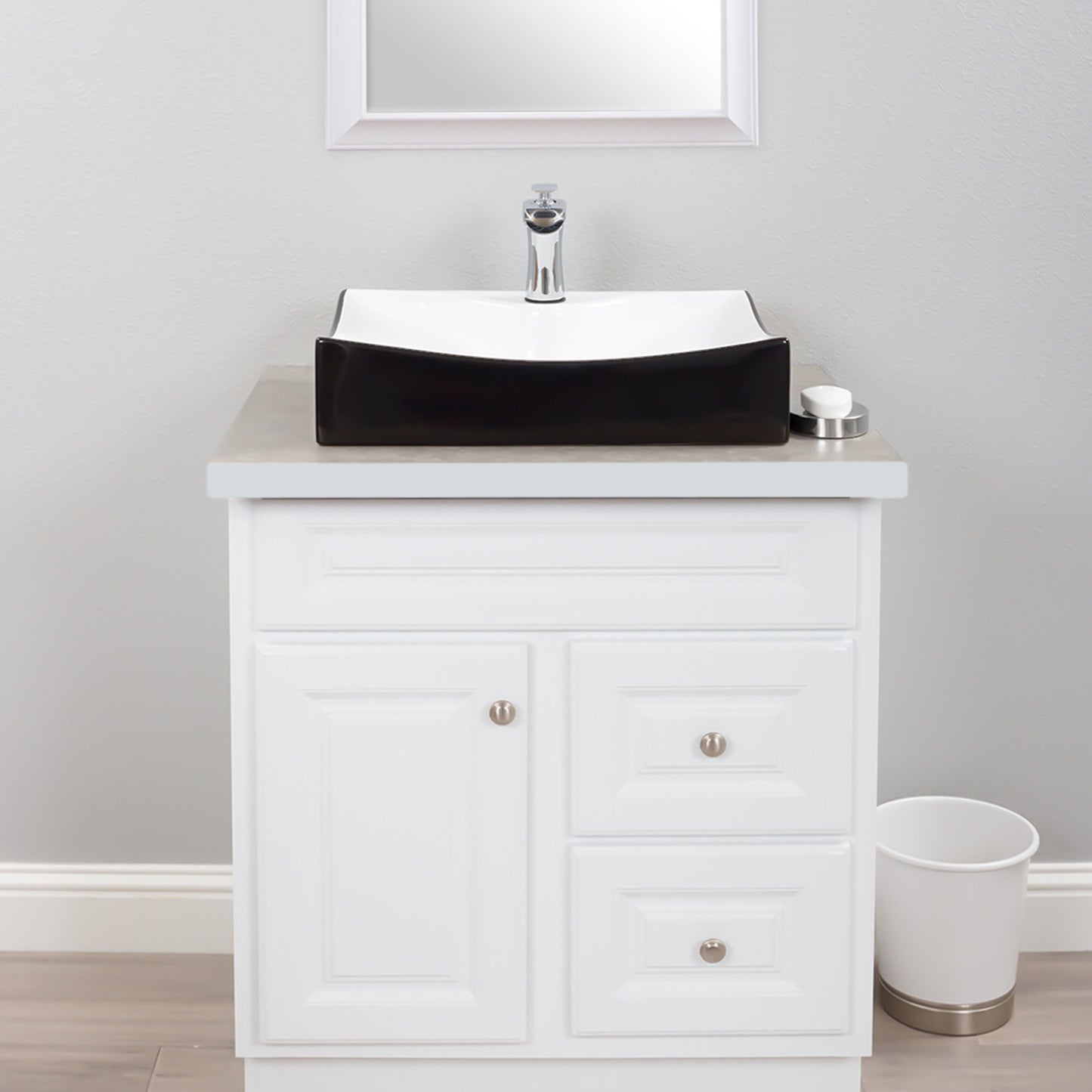 black and white bath sink with faucet and drain lifestyle
