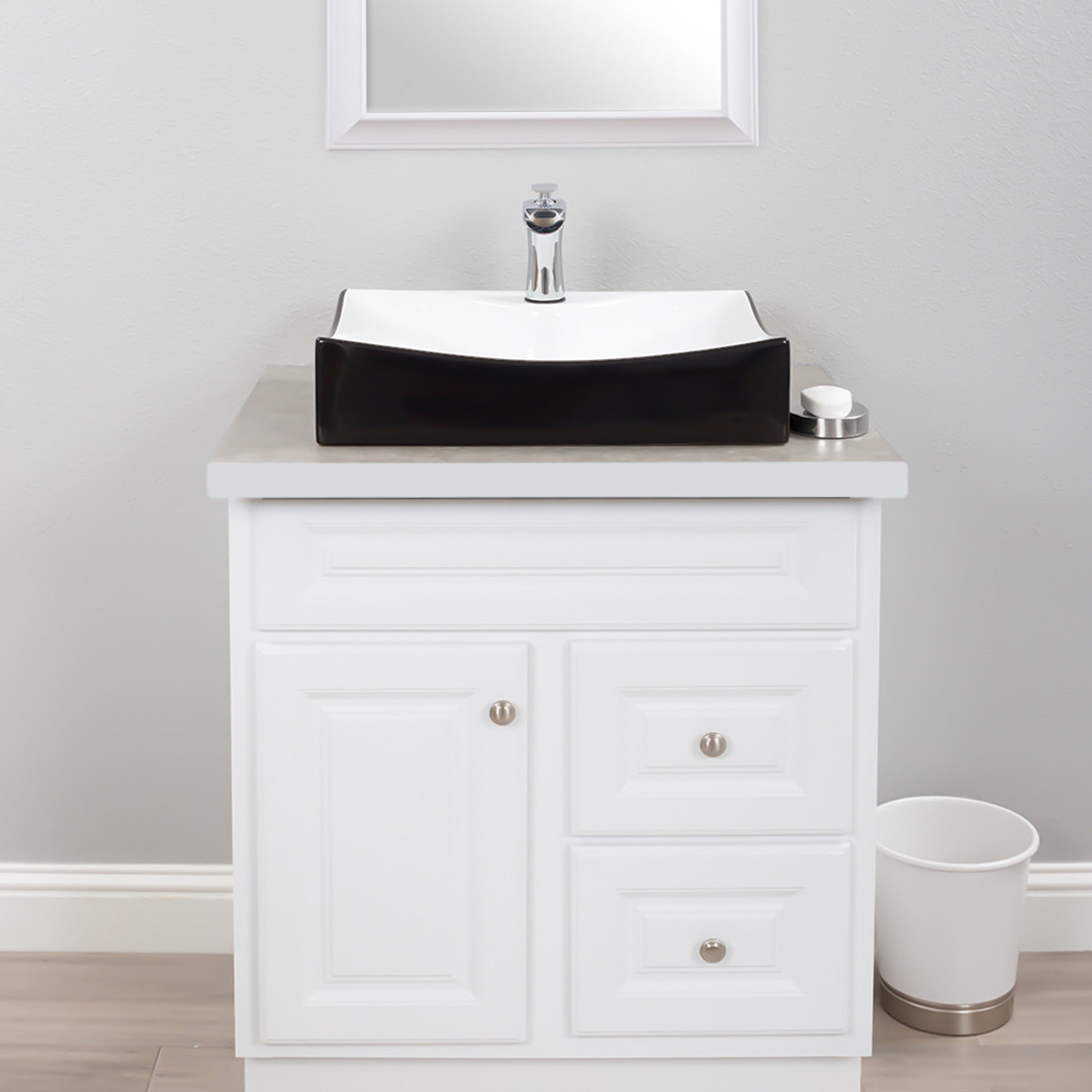 black and white bath sink with faucet and drain lifestyle