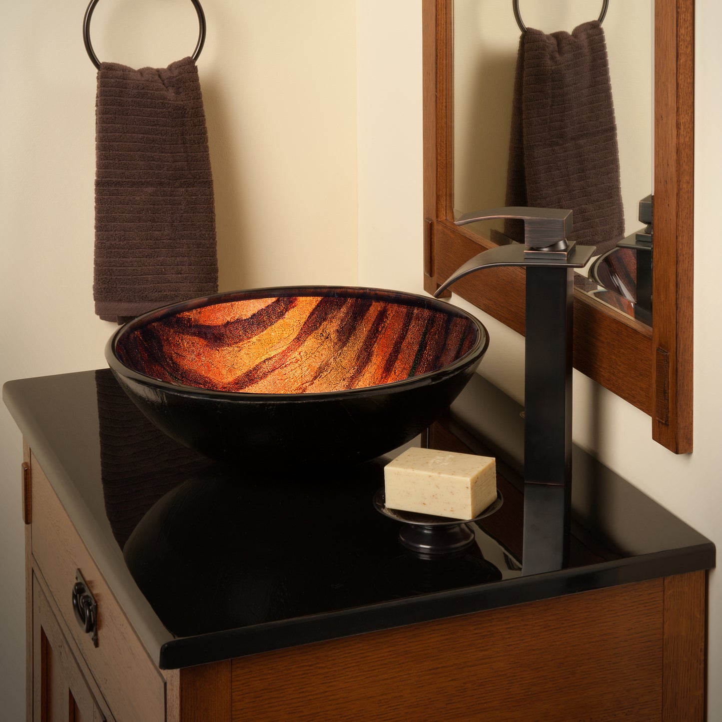 Hand-painted brown camouflage glass vessel sink by Novatto, modern bathroom sink with artistic design on clear glass.