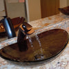 brown oval glass sink lifestyle