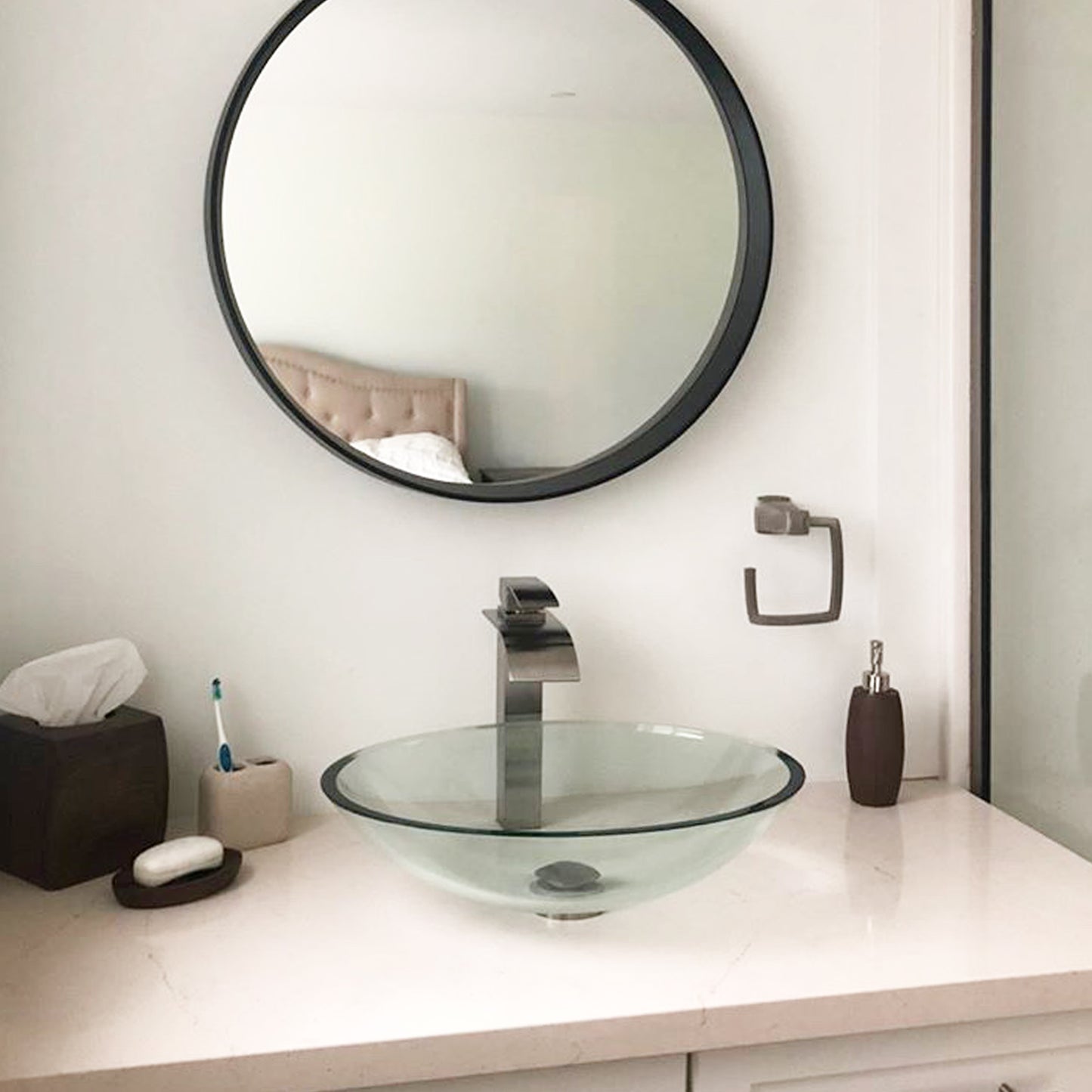 clear glass vessel sink and faucet set lifestyle