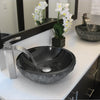 black granite vessel sink with Eclipse faucet set