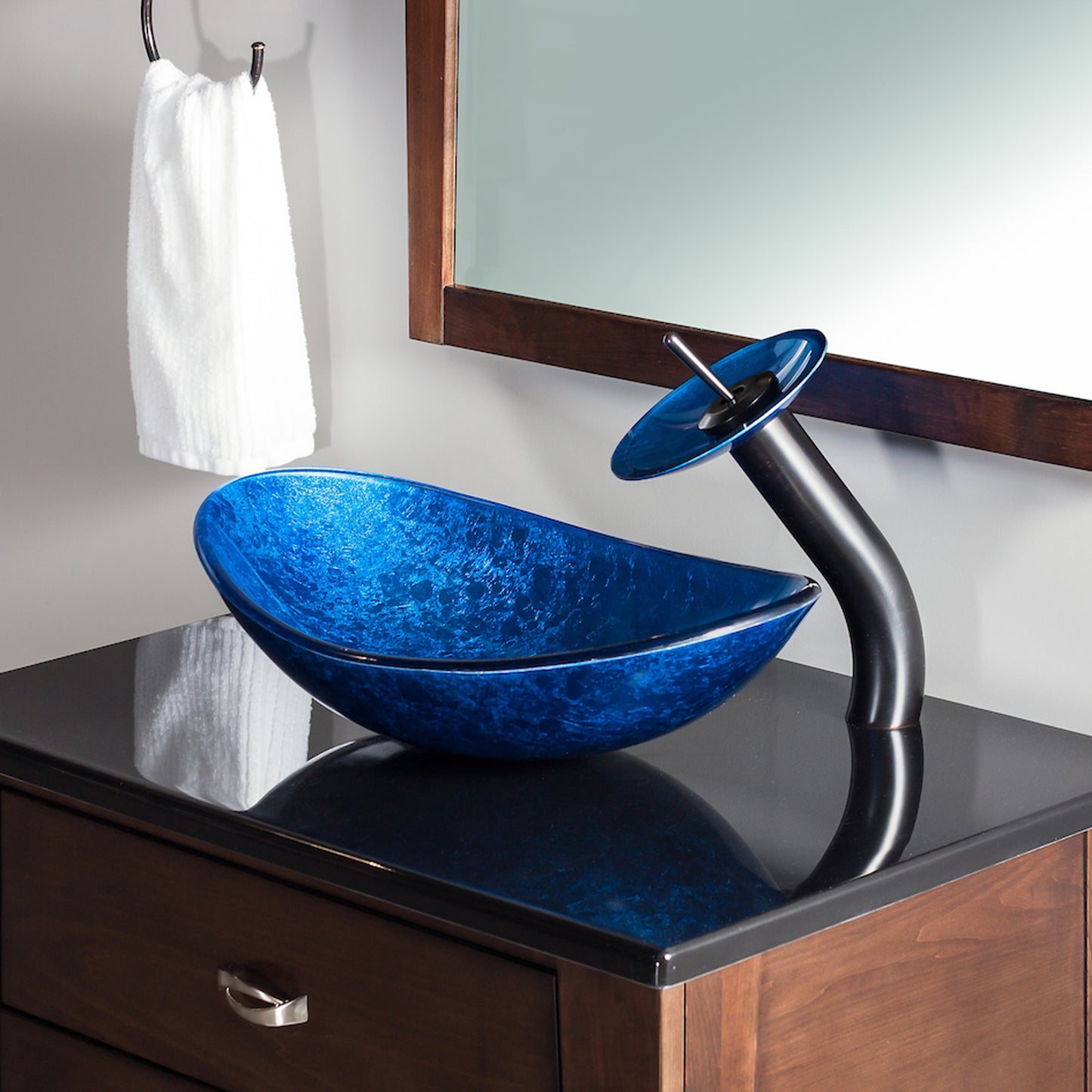 blue glass oval vessel sink set lifestyle