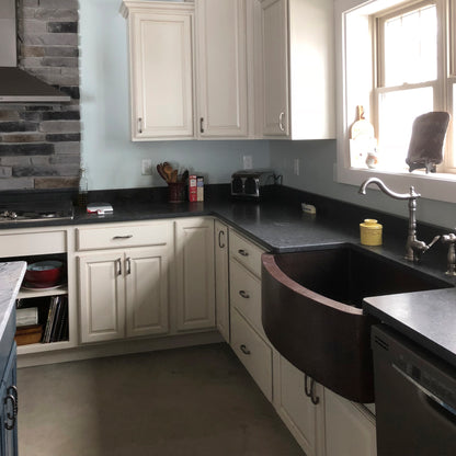 curved farmhouse copper kitchen sink lifestyle