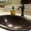 copper drop-in bathroom sink lifestyle