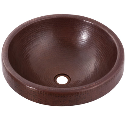 Round copper drop-in bathroom sink by Novatto with antique finish, featuring a traditional design and front view.