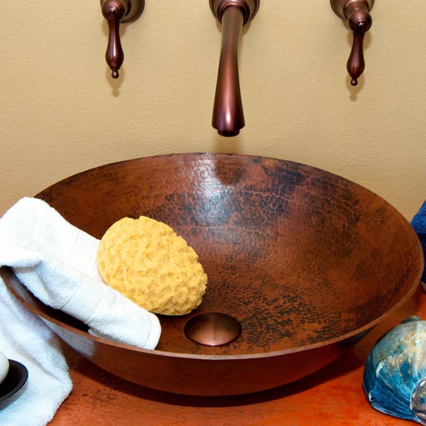 round copper vessel sink lifestyle