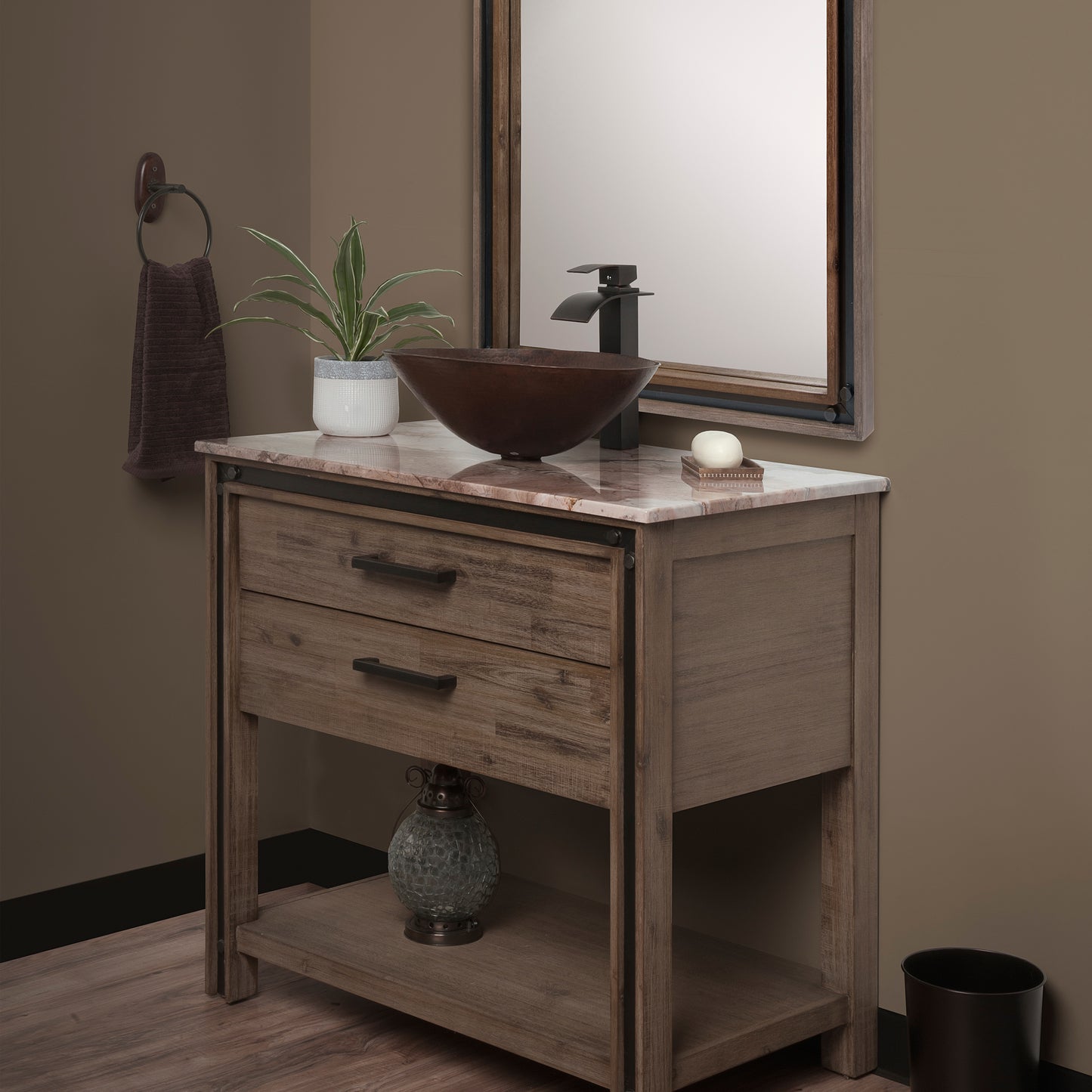 Oval hammered copper vessel bathroom sink by Novatto with antique finish, shown in a modern bathroom setting.